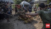 FOTO : Prosesi Penyembelihan Hewan Kurban Saat Pandemi Corona Pelaksanaan Idul Kurban tahun ini berbeda dengan tahun-tahun sebelumnya karena pandemi corona. Protokol kesehatan diterapkan.