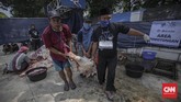 FOTO : Prosesi Penyembelihan Hewan Kurban Saat Pandemi Corona Pelaksanaan Idul Kurban tahun ini berbeda dengan tahun-tahun sebelumnya karena pandemi corona. Protokol kesehatan diterapkan.
