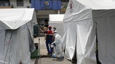 FOTO: Filipina Kembali Lockdown Usai Lonjakan Kasus Corona Presiden Filipina, Rodrigo Duterte, kembali menerapkan lockdown bagi sebagian ibu kota Manila menyusul adanya lonjakan kasus virus corona.