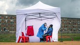 FOTO: Kasus Positif Corona di Afrika Tembus 1 Juta Kasus infeksi virus corona di Benua Afrika hingga saat ini telah menyentuh 1.011.876 dan 22.114 kematian.