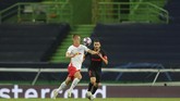 FOTO: Drama Leipzig Tekuk Atletico di Menit Akhir RB Leipzig menang 2-1 atas Atletico Madrid di babak perempat final Liga Champions, Jumat (14/8), berkat gol Tyler Adams yang dicetak pada menit ke-88.