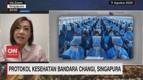 VIDEO: Penumpang Pesawat Pakai APD di Bandara Changi
