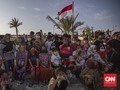 FOTO: Santai Sejenak di Taman Tanggul Laut Kalibaru Jakarta