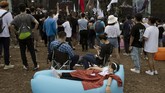 FOTO: Euforia Festival Musik di China Digelar kala Pandemi Di tengah situasi pandemi yang masih melanda banyak negara di dunia, China justru membuka konser luar ruang pertama pada tahun ini, Midi Music Festival.