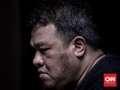 FOTO: Dandhy Laksono, Kritik, dan Sandera Status Tersangka