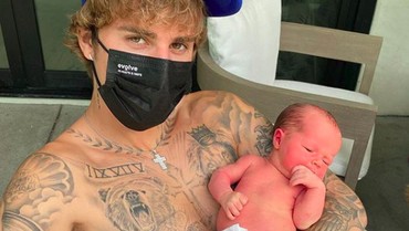Gendong Bayi, Justin Bieber Didoakan Punya Anak Tahun Depan