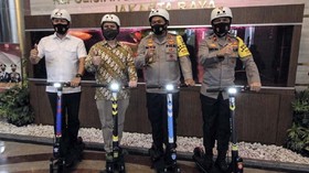 Dukung Polisi Adaptasi New Normal, Grab Donasi 30 GrabWheels