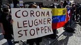 FOTO: Jerman Dilanda Demo Anti Corona Jerman dilanda aksi unjuk rasa menentang kebijakan lockdown yang dilakukan pemerintah demi menekan penyebaran virus corona.