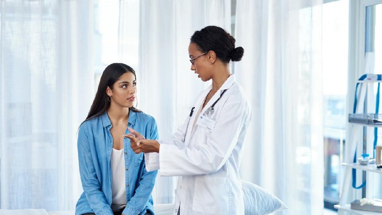 check up Shot of a young woman having a consultation with her doctor