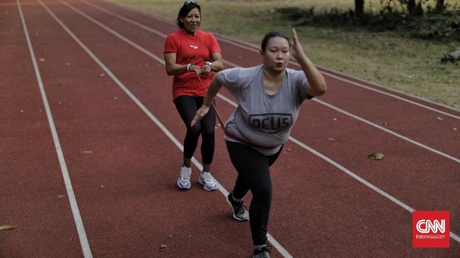 FOTO: Jaga Badan Agar Tak Cedera Saat Olahraga