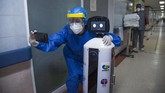 FOTO: Era Robot di Tengah Pandemi Covid-19 Internet dan teknologi robot disebut akan menjadi infrastruktur yang paling dibutuhkan di era normal baru demi memutus pandemi virus corona.