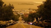 FOTO: Langit 'Mars' akibat Kebakaran Hutan California Kebakaran hutan besar-besaran yang terjadi di California memicu fenomena langit 'Mars' berwarna merah hingga oranye tua pada Rabu (9/9) pagi waktu setempat.