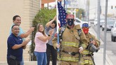FOTO: Kala New York Mengenang Korban Tragedi 9/11 Pekan ini, warga kota New York mengenang tragedi 9/11 yang merenggut nyawa ribuan orang.
