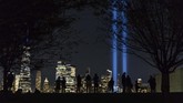 FOTO: Kala New York Mengenang Korban Tragedi 9/11 Pekan ini, warga kota New York mengenang tragedi 9/11 yang merenggut nyawa ribuan orang.