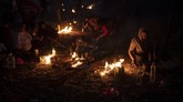 FOTO: Nestapa Imigran di Yunani Usai Penampungan Terbakar Pemerintah Yunani mulai memindahkan para pendatang dan pencari suaka ke kamp darurat di Pulau Lesbos.