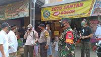 Pimpinan Ranting Muhammadiyah Puri Gading Bagi Masker-Rapid Tes Gratis