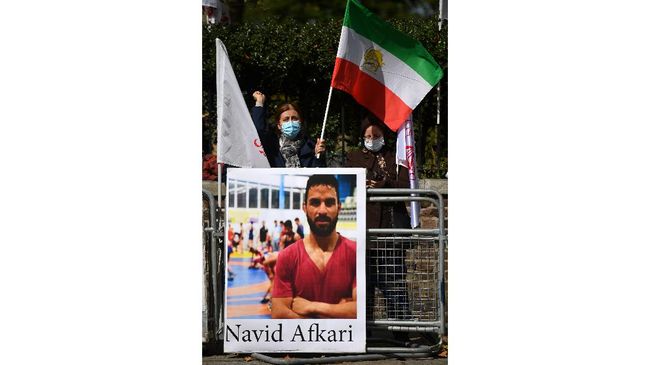 Pegulat Iran Dieksekusi Mati Atas Tuduhan Pembunuhan Pegular Iran, Navid Afkari dieksekusi mati pada Sabtu (13/9) atas tuduhan melakukan aksi pembunuhan.