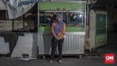 FOTO: Suara Wong Cilik di Tengah Lika-Liku Covid-19 Penutupan kantor, tempat wisata, hingga hiburan karena PSBB Jakarta telah memengaruhi sejumlah pekerja informal yang turut menggantungkan hidup di sana.
