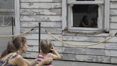FOTO: Seni Instalasi Rumah Aktivis AS Dipamerkan di Italia Seni instalasi rumah aktivis Hak Asasi Manusia asal Amerika Serikat, Rosa Parks, dipamerkan di Royal Palace, Naples, Italia.