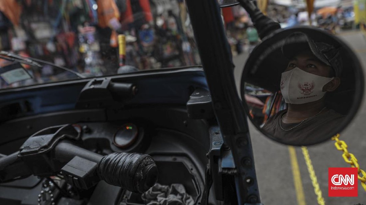 FOTO: Masker Scuba dan Buff Tak Efektif Cegah Corona