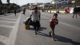 FOTO: Migran Korban Kebakaran di Yunani Pindah ke Kamp Baru Ribuan migran korban kebakaran di kamp pengungsian Moria, Pulau Lesbos, Yunani mulai dipindahkan ke penampungan sementrara di Kara Tepe.