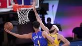 FOTO: Lakers Lumat Nuggets di Gim 1 Final Wilayah Barat NBA Los Angeles Lakers menang atas Denver Nuggets di final wilayah barat NBA. Berikut foto pilihan laga tersebut.