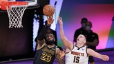 FOTO: Buzzer Beater Davis Bawa Lakers Unggul 2-0 Anthony Davis melakukan buzzer beater dan membawa LA Lakers menang 105-103 atas Denver Nuggets di gim kedua final wilayah barat.
