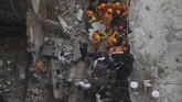 FOTO: Bangunan 4 Lantai di Mumbai Runtuh, 15 Tewas Korban tewas akibat bangunan runtuh di pinggiran kota Mumbai, negara bagian Maharashtra, India kini mencapai 15 orang dan 25 orang diduga masih terjebak.
