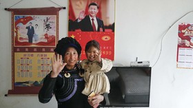 FOTO: Potret Xi Jinping Wajib Hiasi Rumah Orang Miskin China