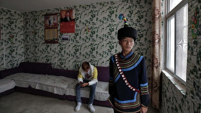 FOTO: Potret Xi Jinping Wajib Hiasi Rumah Orang Miskin China