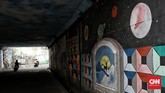 FOTO: Kolong Dipo KRL Depok yang Tampak Suram Kembali Kolong Dipo KRL di Depok, Jawa Barat, yang pernah dihiasi mural pada 2018 untuk menghilangkan kesan angker, kini tampak suram kembali.