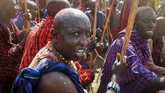 FOTO: Suku Maasai Gelar Upacara Tradisi di Tengah Pandemi Suku Maasai di Kenya menggelar upacara tradisional mereka di tengah pandemi pada Rabu (23/9). (AP Photo)