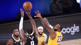 FOTO: LeBron dan Davis Ngamuk, Lakers Hajar Nuggets Los Angeles Lakers bangkit di final wilayah barat NBA dengan mengalahkan Denver Nuggets di game keempat berkat LeBron James dan Anthony Davis.