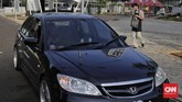 FOTO: Layanan Drive Thru Wisata Kuliner demi Cegah Kerumunan Pengelola restoran di kawasan Thamrin, Jakarta Pusat menerapkan layanan drive thru demi mencegah potensi kerumunan yang berisiko menyebarkan virus corona.