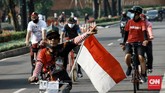 FOTO: PSBB Ketat Tak Halangi Warga Tetap Olahraga di GBK Warga kembali menyambangi kawasan Gelora Bung Karno (GBK) Senayan Jakarta, Minggu (27/9) pagi, meski masih dalam masa PSBB ketat.