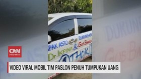 VIDEO: Viral Mobil Paslon Penuh Tumpukan Uang