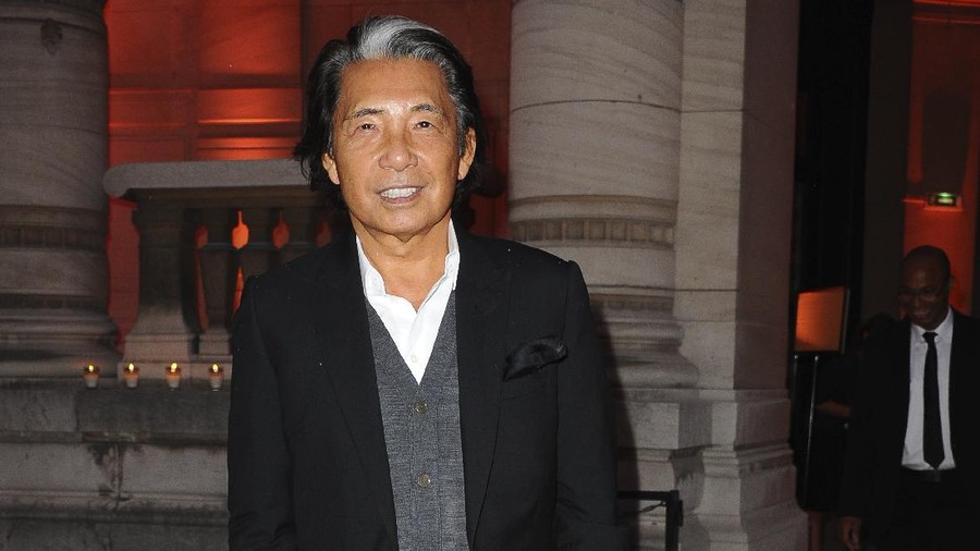 FILE - In this Wednesday, Sept. 25, 2013 file photo, Japanese fashion designer Kenzo Takada arrives at the Alaia exhibit Gala in Paris. Fashion designer Kenzo Takada dies from COVID-19 complications at age 81 near Paris, spokeswoman and reports said Sunday Oct. 4, 2020. (AP Photo/Zacharie Scheurer, file)