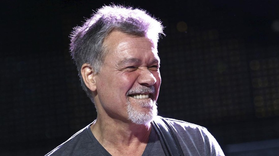 FILE - Eddie Van Halen of Van Halen performs on Aug. 13, 2015, in Wantagh, N.Y. Van Halen, who had battled cancer, died Tuesday, Oct. 6, 2020. He was 65. (Photo by Greg Allen/Invision/AP, File)