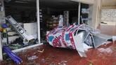 FOTO: Badai Delta Terjang Meksiko Badai delta diaporkan melesat ke arah Semenanjung Yucatan di Meksiko dengan kecepatan angin 120mph dan sampai di selatan kota Cancun pada Rabu (7/10).