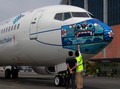 Kampanye Protokol Covid, Pesawat Garuda Pakai Masker Barong
