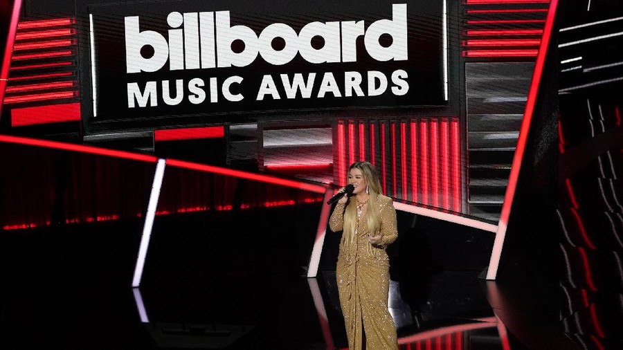 Host Kelly Clarkson performs at the Billboard Music Awards on Wednesday, Oct. 14, 2020, at the Dolby Theatre in Los Angeles. (AP Photo/Chris Pizzello)