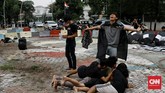 FOTO: Aksi Damai Menolak Kekerasan Aliansi Menolak Lupa menggelar aksi damai di Jakarta Pusat. Mereka menuntut agar kepolisian tidak lagi melakukan tindakan represif saat mengawal demonstrasi.