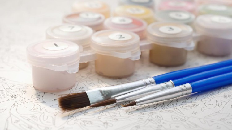 Melukis paint by numbers Female hand coloring paint by numbers picture. Creative hobby. Leisure activity at home during self-isolation COVID-19