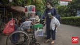 FOTO: Perjuangan Pedagang Difable Jajakan Masker Saat Pandemi Budi (39) sebagai seorang pedagang difabel turut mencari rezeki dengan menjajakan masker di tengah pandemi.