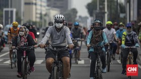 FOTO: Masker, Jurus Rutin Lawan Covid-19