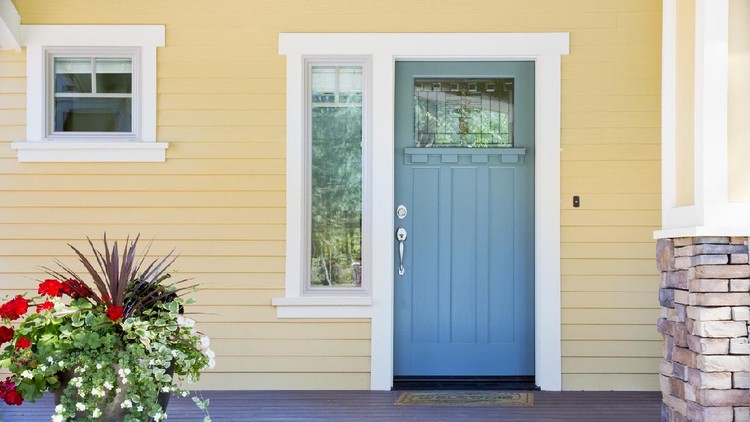 Ilustrasi pintu rumah minimalis Panorama frame The red front door of a house with concrete exterior wall and shutters on window. Doormat and potted flowers are placed by the doorstep.