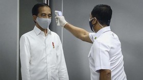 Jokowi Klaim Kasus Covid Makin Turun Tanpa Kurangi Jumlah Tes