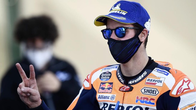 Alex Marquez mengaku menahan sakit dan kesemutan pada tangannya saat membalap di MotoGP Valencia 2020, Minggu (15/11).