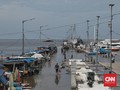 FOTO : Berhari-hari Banjir Rob Rendam Pelabuhan Kali Adem