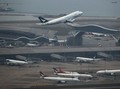 FOTO: Wajah Muram Cathay Pacific Tertekan Corona